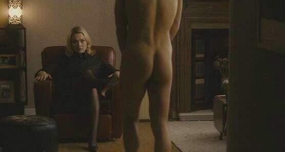 Naked man being stared at by clothed woman